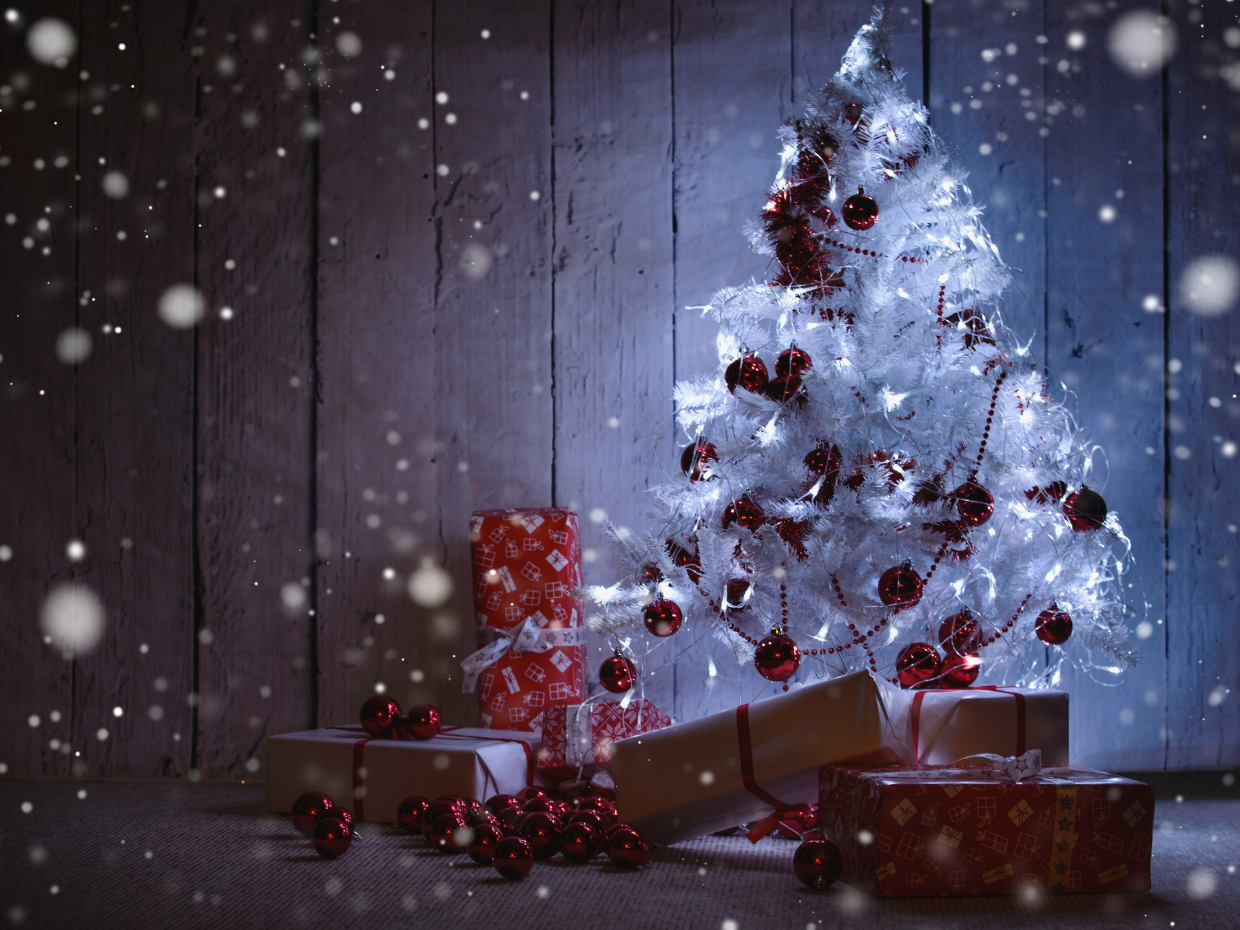 White Christmas Tree With Gifts And Frosty Lights